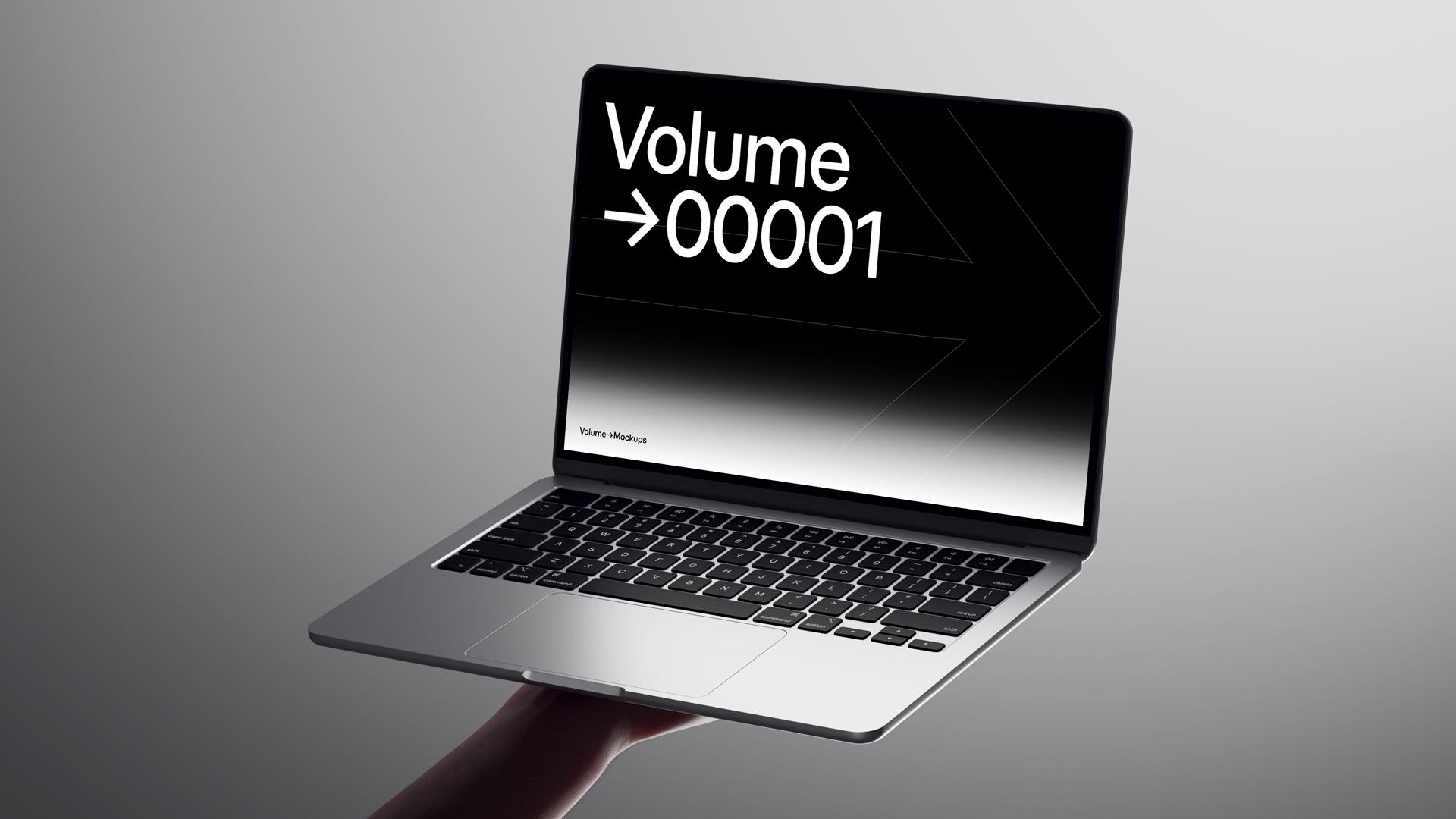 MacBook Mockups in Hands scene 11