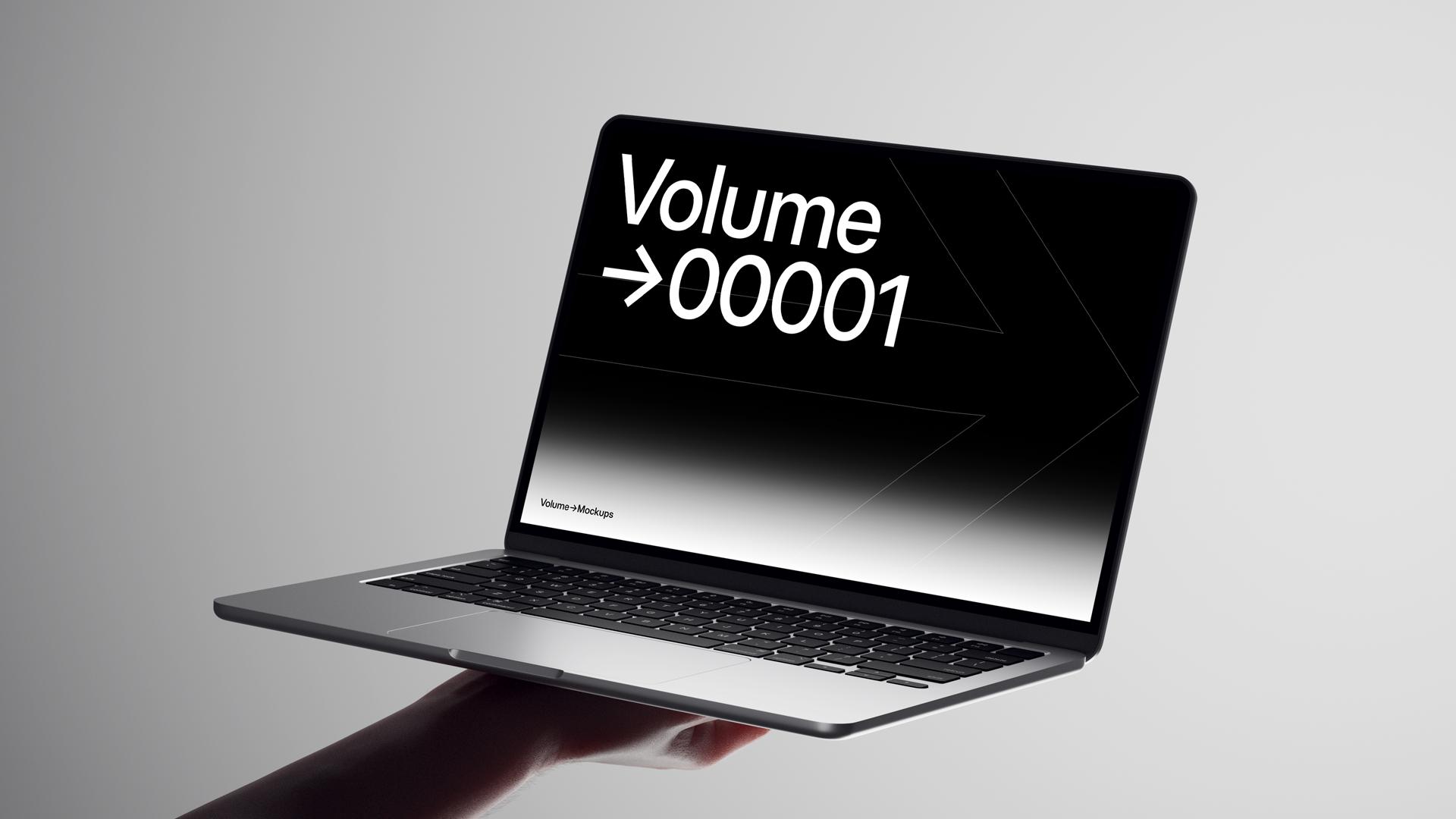 MacBook Mockups in Hands scene 12